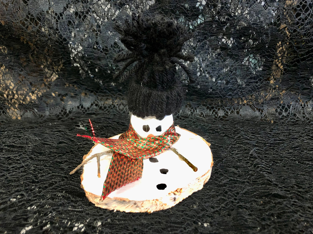 Melted Snowman with Black Hat and Red, Green, and Gold Wide Scarf