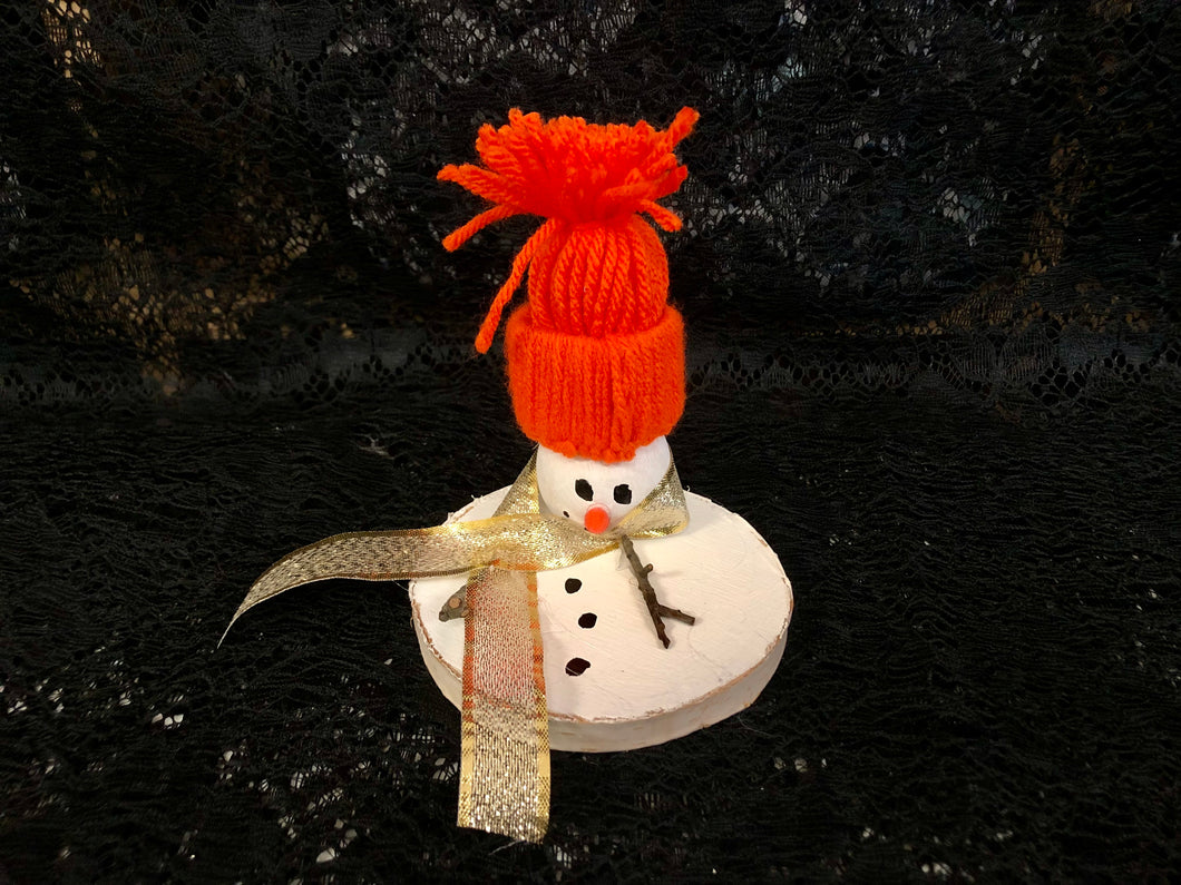 Melted Snowman with Orange Hat and Gold Scarf