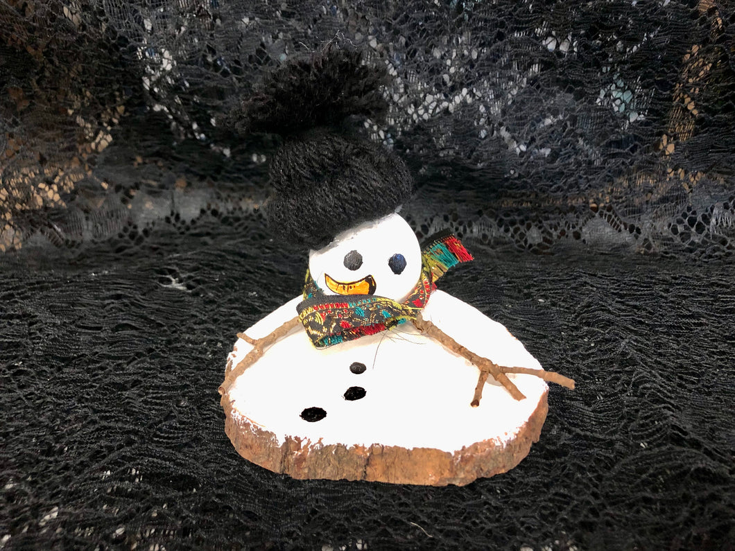 Melted Snowman with Black Hat and Small Black, Red, Green, and Gold Scarf