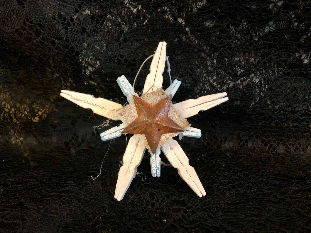 White Star Clothes Pin Ornament with Brown Middle and some Blue Clothes Pins