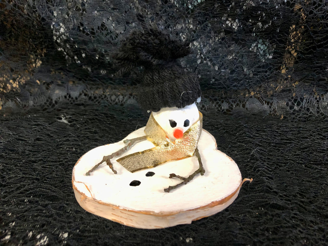 Melted Snowman with Black Hat and Gold Scarf